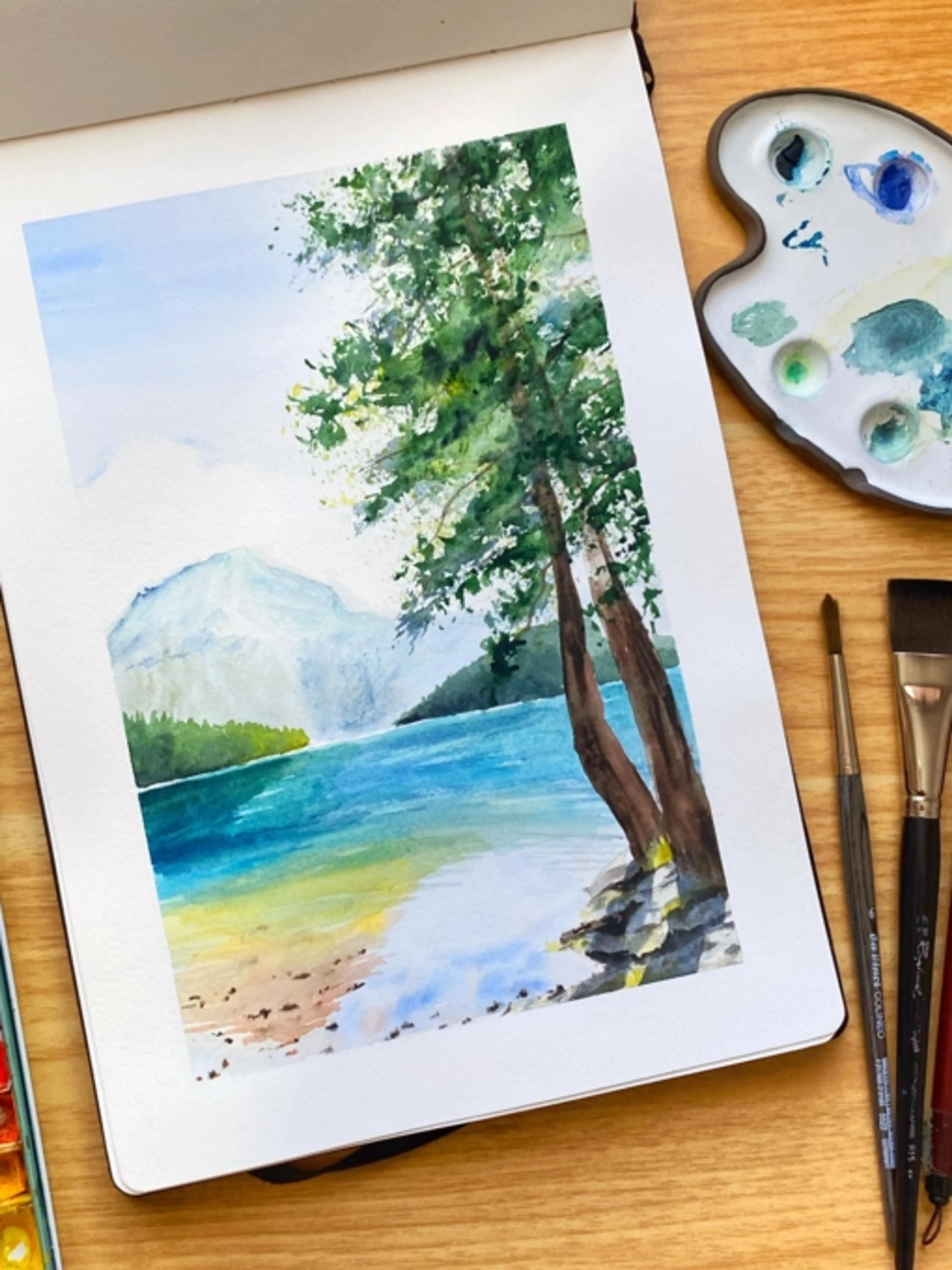 Image de présentation pour l'offre Apprends à peindre un lac avec des reflets à l’aquarelle par Diane