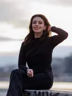 Justine vous présente ses services sur la plateforme Wooskill.